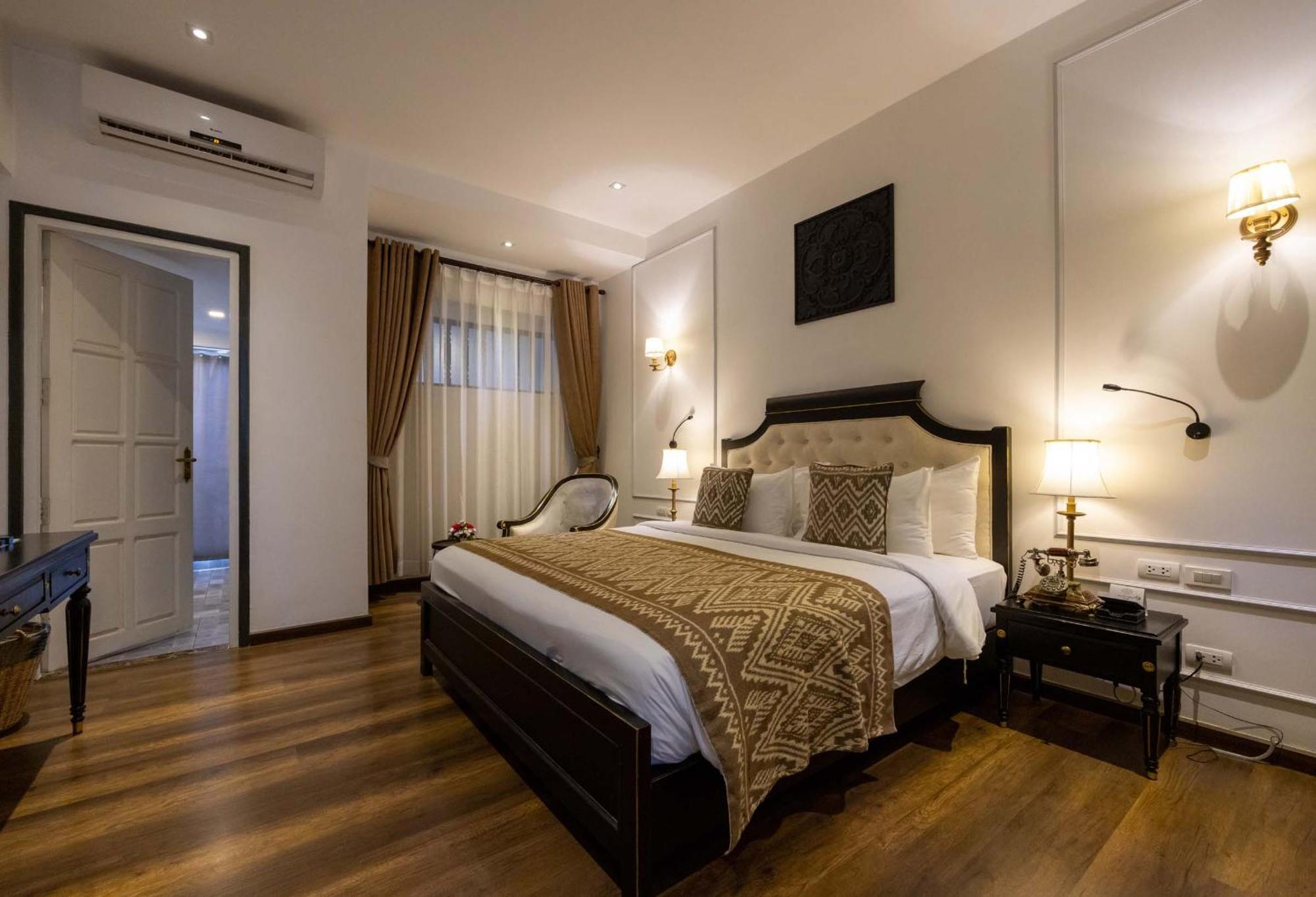Le Thatluang D'Or Boutique Hotel Vientiane Bagian luar foto
